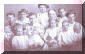Starting from lower left.......boy setting on mans lap! 1. Gus Bell 2. Man holding Gus, his dad David Tilden Bell, blond girl in front of DTB is Daisy Bell, she will marry Charlie Harless 3.to the left of DTB is his wife Salina Elizabeth Foreman Bell...4. the child she is holding is Mabel Bell.......5. the girl between DTB and Salina is Pearl Bell.........now the Cannons........Man & Wife is John Cannon & his wife Lee (Bell, sis to DTB) Cannon.....their kids.......one standing with hat is Walter Cannon, the girl between John and Lee is Beulah.......John is holding Cora, next to Cora is Price and the extreme bottom right is Tilden Cannon..........oh and Lee Bell Cannons name is Mary Rosealee "Lee" Bell Cannon Submitted by Dean Harless (ldh@intellex.com)